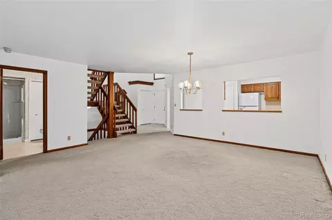 Living - 1448 Beaumont Ct, Flushing, MI 48433 photo 5 of 7