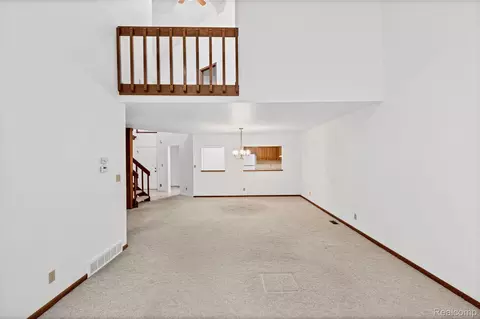Living - 1448 Beaumont Ct, Flushing, MI 48433 photo 4 of 7