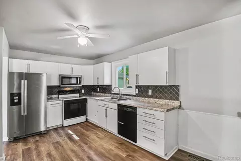Kitchen - 611 S Main St, Davison, MI 48423 photo 2 of 2