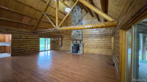 Living - 2608 E Sutton Rd, Metamora, MI 48455 photo 2 of 3