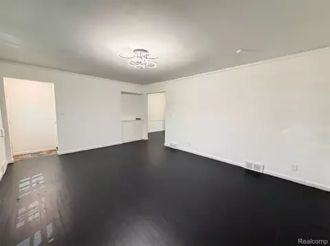 Living - 8573 E Outer Dr, Detroit, MI 48213 photo 4 of 4