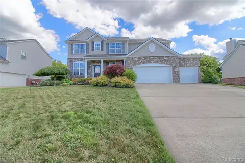 57649 Blossom Valley Trl, Lyon, MI 48165