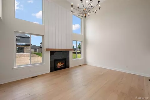 Living - 24463 Tribute Dr, Macomb, MI 48042 photo 1 of 7