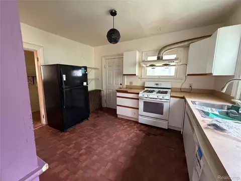 Kitchen - 718 River St, Owosso, MI 48867 photo 2 of 3