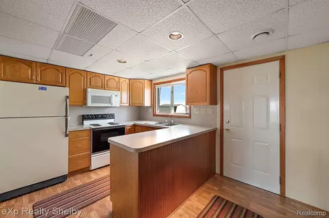 Kitchen - 8395 N Channel - Harsens Is, Clay, MI 48001 photo 2 of 2