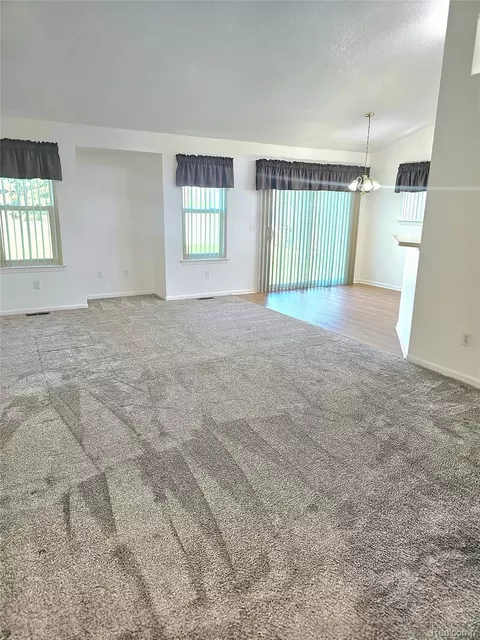 Living - 450 Lilly View Court Ct, Genoa, MI 48843 photo 2 of 2