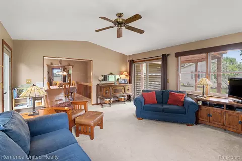 Living - 136 Endicott Dr, Oceola, MI 48843 photo 1 of 3