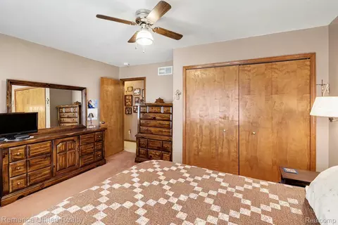 Bedroom - 136 Endicott Dr, Oceola, MI 48843 photo 2 of 4