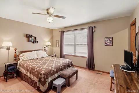 Bedroom - 136 Endicott Dr, Oceola, MI 48843 photo 1 of 4