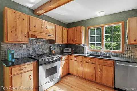 Kitchen - 2411 Farmbrook Trl, Addison, MI 48370 photo 3 of 5