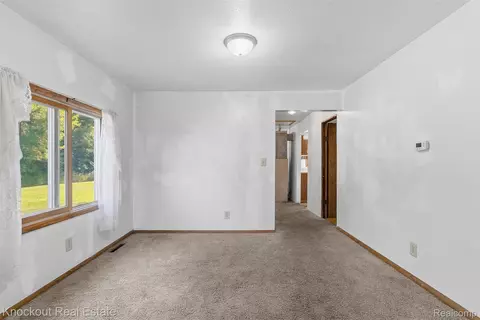 Living - 12845 Bueche Rd, Albee, MI 48417 photo 4 of 5