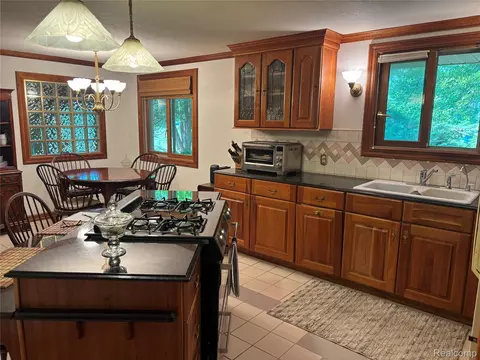 Kitchen - 709 E Michigan Ave E, Au Gres, MI 48703 photo 3 of 3