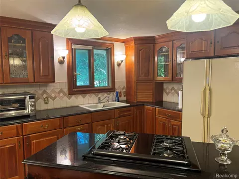 Kitchen - 709 E Michigan Ave E, Au Gres, MI 48703 photo 1 of 3