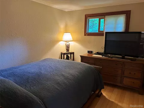 Bedroom - 709 E Michigan Ave E, Au Gres, MI 48703 photo 1 of 2