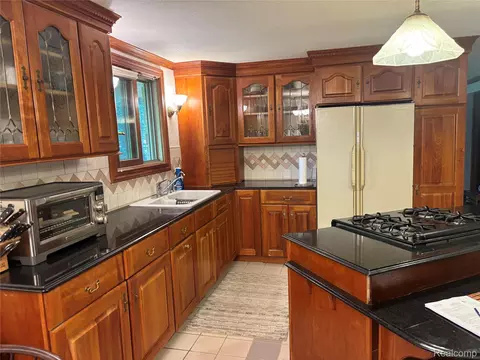 Kitchen - 709 E Michigan Ave E, Au Gres, MI 48703 photo 2 of 3