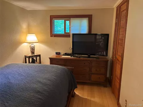 Bedroom - 709 E Michigan Ave E, Au Gres, MI 48703 photo 2 of 2