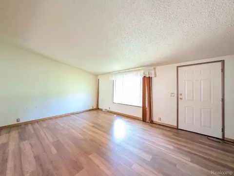 Living - 4024 E 54th St, Mount Morris, MI 48458 photo 1 of 3