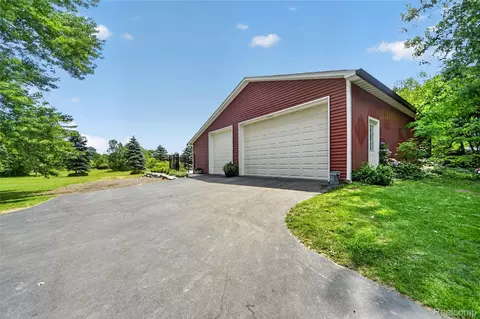 Exterior - 13635 Unadilla Rd, Unadilla, MI 48137 photo 3 of 14