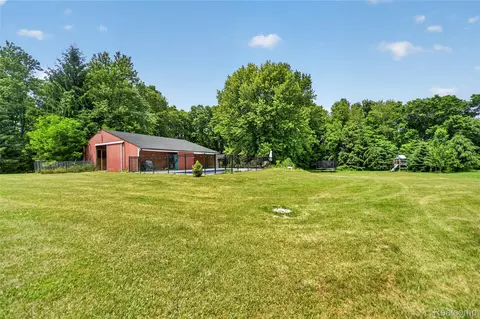 Exterior - 13635 Unadilla Rd, Unadilla, MI 48137 photo 11 of 14