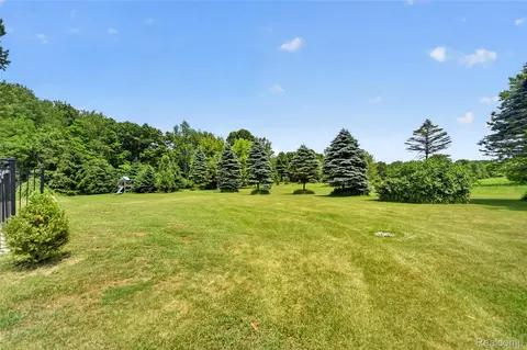 Exterior - 13635 Unadilla Rd, Unadilla, MI 48137 photo 12 of 14
