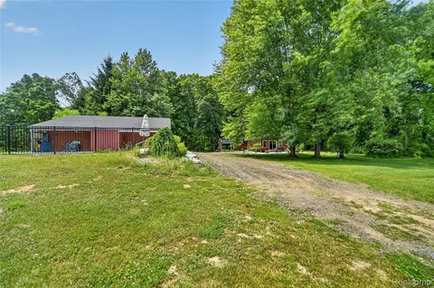 Exterior - 13635 Unadilla Rd, Unadilla, MI 48137 photo 10 of 14