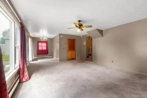 Living - 37483 Barth St, Romulus, MI 48174 photo 5 of 6