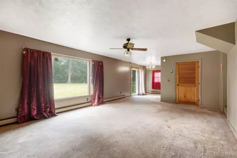 Living - 37483 Barth St, Romulus, MI 48174 photo 4 of 6