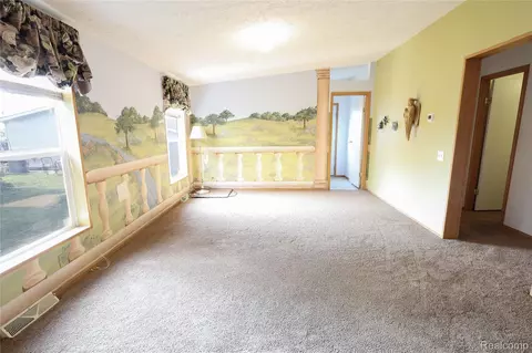 Living - 3423 Green Apple Ct, Ash, MI 48117 photo 2 of 3