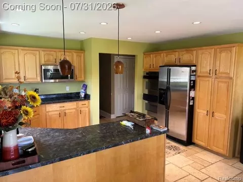 Kitchen - 18987 Pine Ln, Macomb, MI 48042 photo 2 of 3
