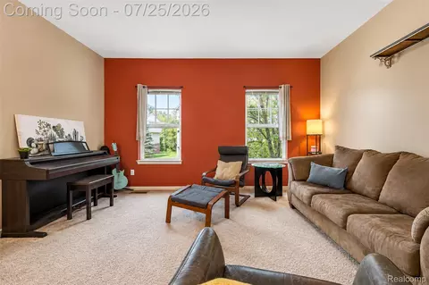 Living - 2204 Knotty Pine Trl, Howell, MI 48855 photo 2 of 4