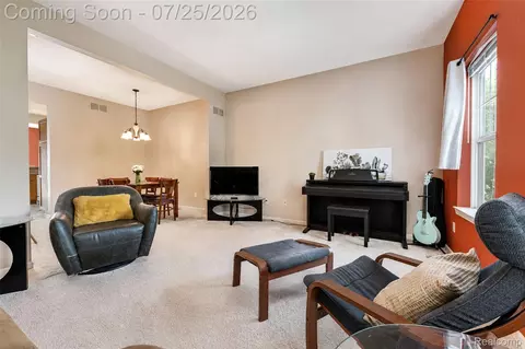 Living - 2204 Knotty Pine Trl, Howell, MI 48855 photo 3 of 4