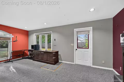 Living - 1141 Springborrow Dr, Flint, MI 48532 photo 4 of 5