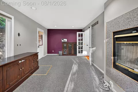 Living - 1141 Springborrow Dr, Flint, MI 48532 photo 5 of 5