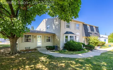 104 Lake Village Dr, Walled Lake, MI 48390
