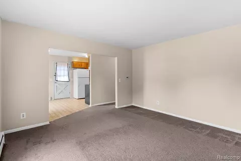 Living - 612 E 3rd St, Flint, MI 48503 photo 2 of 2