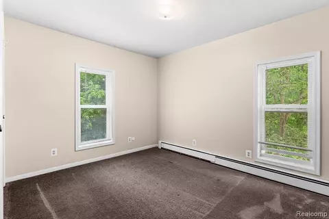 Bedroom - 612 E 3rd St, Flint, MI 48503 photo 8 of 9