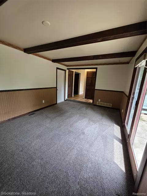 Living - 1243 Pickwick Pl, Flint, MI 48507 photo 2 of 2
