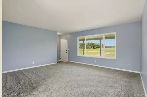 Living - 7500 E Frances Rd, Mount Morris, MI 48458 photo 1 of 3
