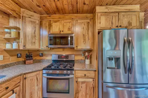 Kitchen - 376 N Abbe Rd, Fairview, MI 48621 photo 4 of 6
