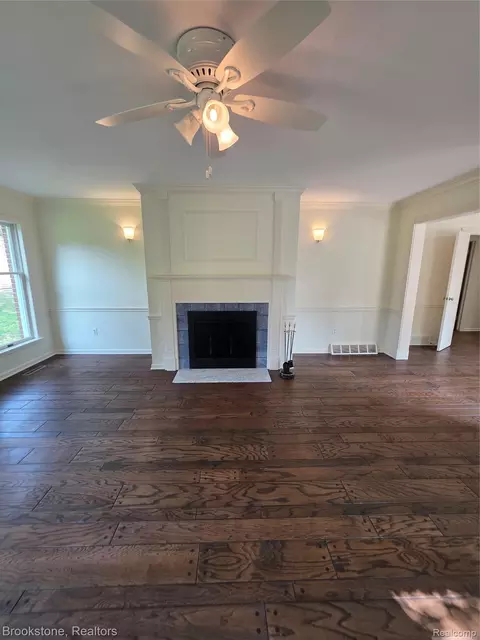 Living - 1210 Springborrow Dr, Flint, MI 48532 photo 4 of 4