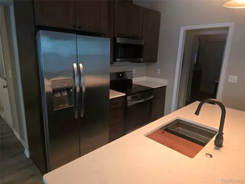 Kitchen - 402 E Buchanan St, Saint Johns, MI 48879 photo 1 of 2