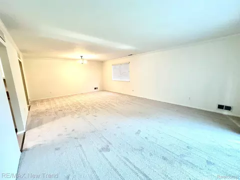 Living - 26949 Farmbrook Villa Dr #96, Southfield, MI 48034 photo 2 of 2