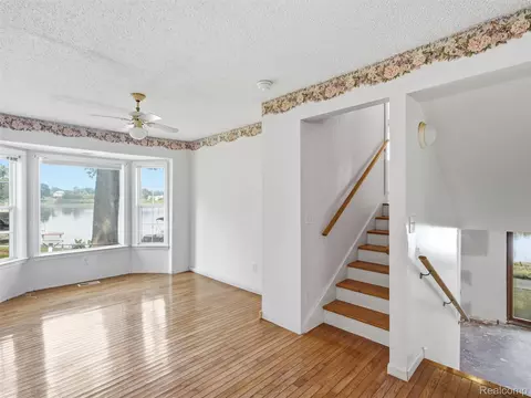 Living - 8954 Patrick Dr, Springfield, MI 48350 photo 11 of 13