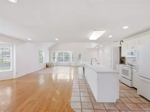 Living - 8954 Patrick Dr, Springfield, MI 48350 photo 4 of 13