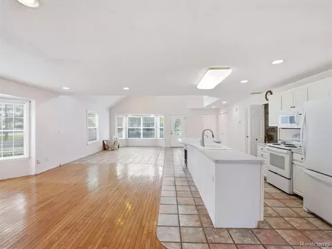 Living - 8954 Patrick Dr, Springfield, MI 48350 photo 5 of 13