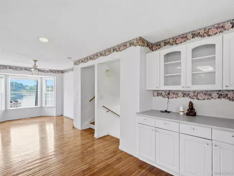 Living - 8954 Patrick Dr, Springfield, MI 48350 photo 6 of 13