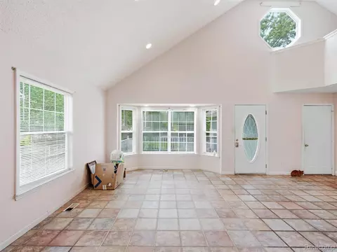 Living - 8954 Patrick Dr, Springfield, MI 48350 photo 8 of 13