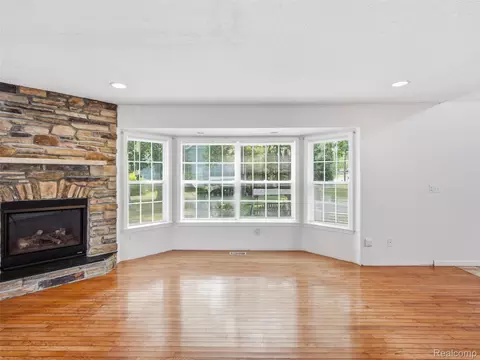 Living - 8954 Patrick Dr, Springfield, MI 48350 photo 2 of 13
