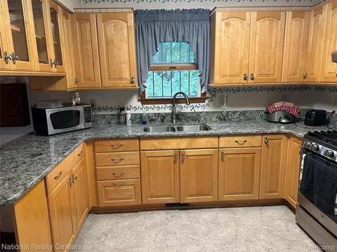 Kitchen - 968 Tyrrell Rd, Shiawassee, MI 48414 photo 1 of 2
