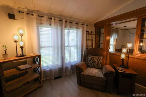Living - 178 Maple Run Ln, Mason, MI 48854 photo 2 of 2
